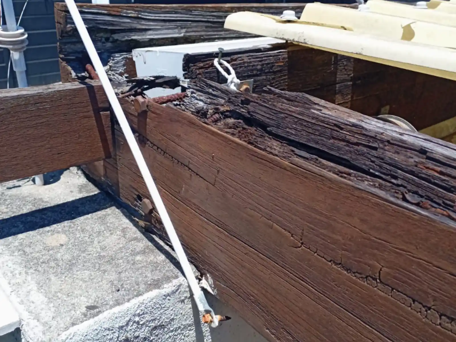 Damaged carport beams before replacement, Bergvliet