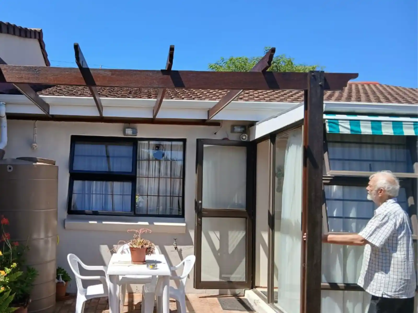 Window awning installation in progress, Pinelands