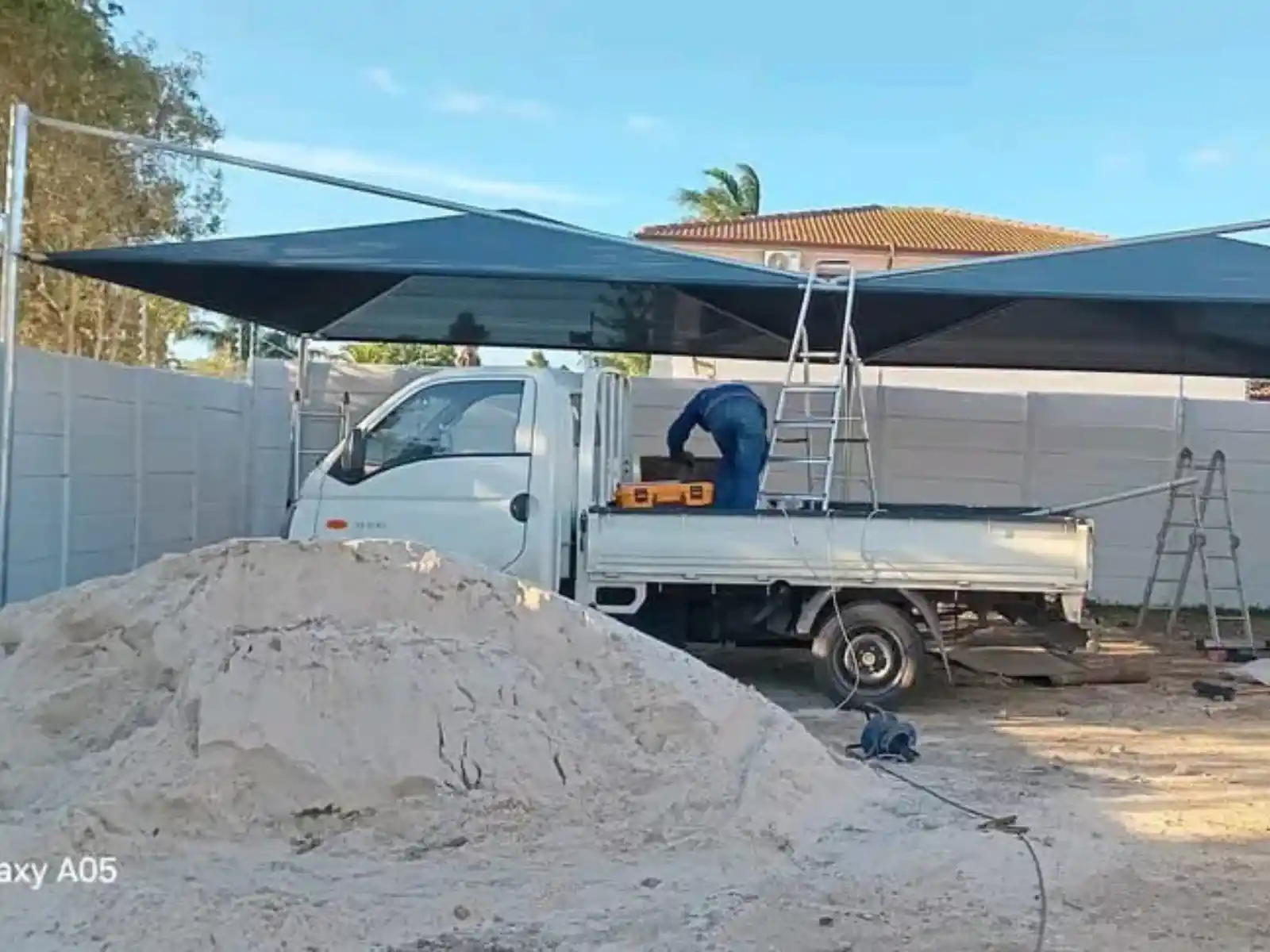 Team installing a cantilever shadeport, Cape Town