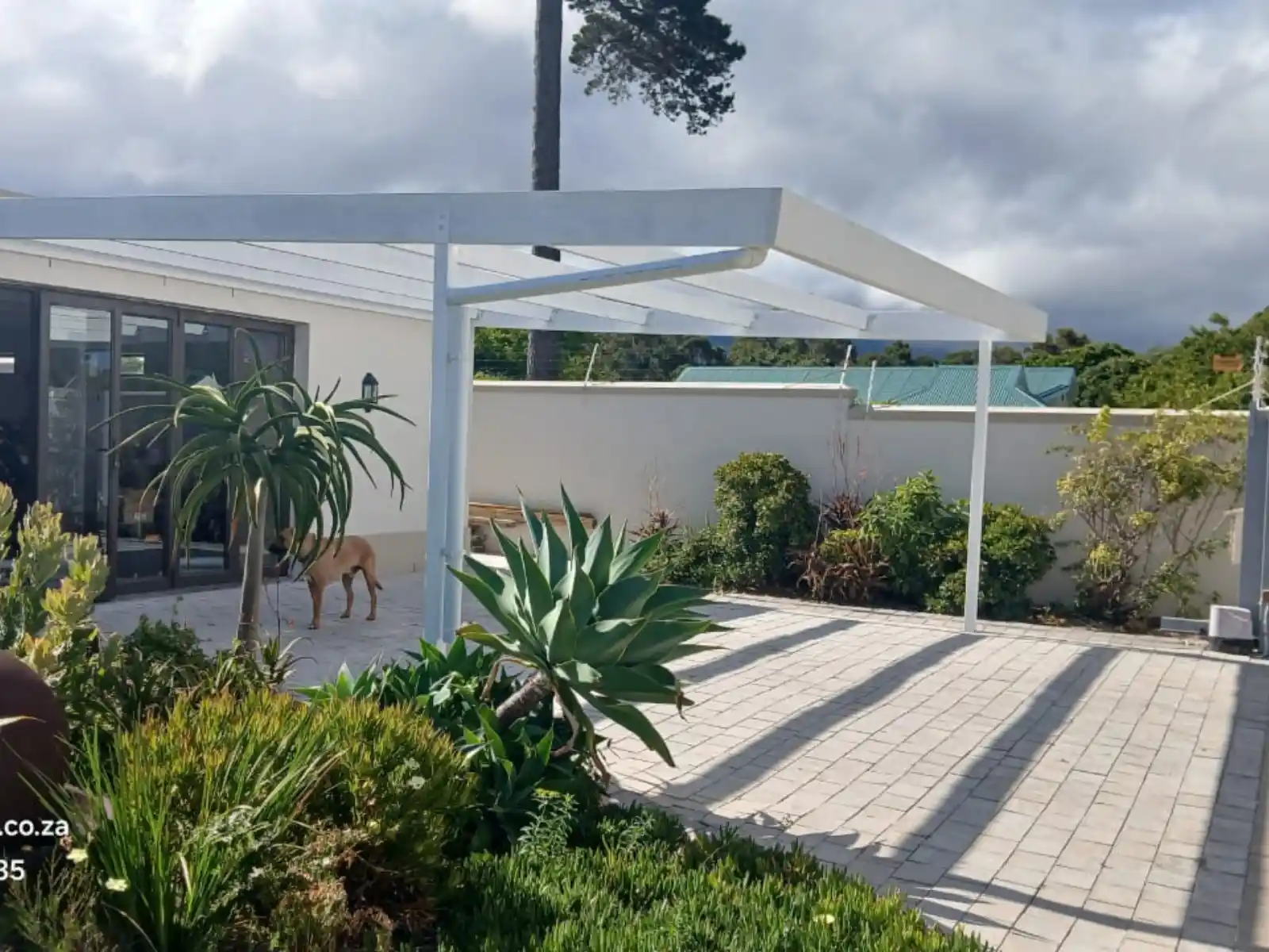 Completed wooden carport project