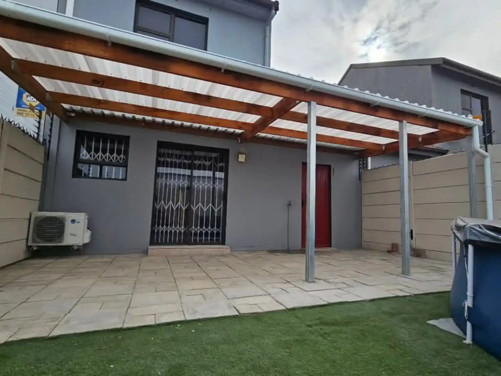 closeup photo of completed wooden carport